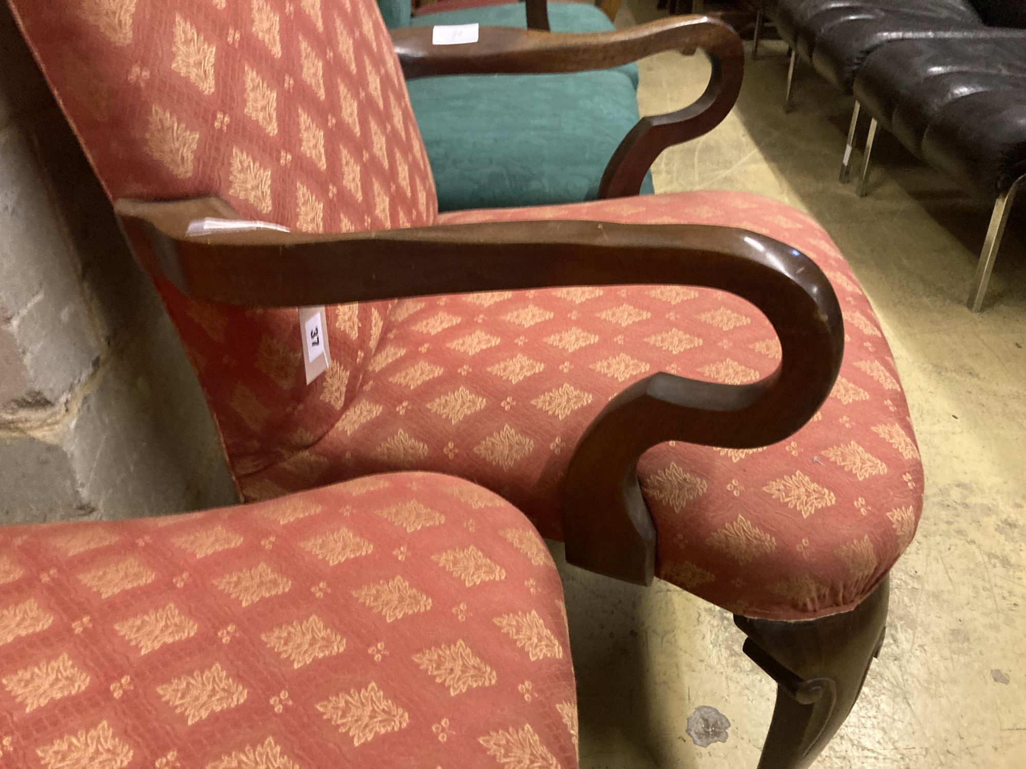 A pair of George I style upholstered mahogany dining chairs (one with arms), width 64cm depth 64cm height 110cm